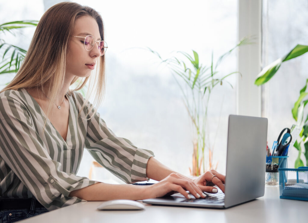 Young Woman Working On A Computer