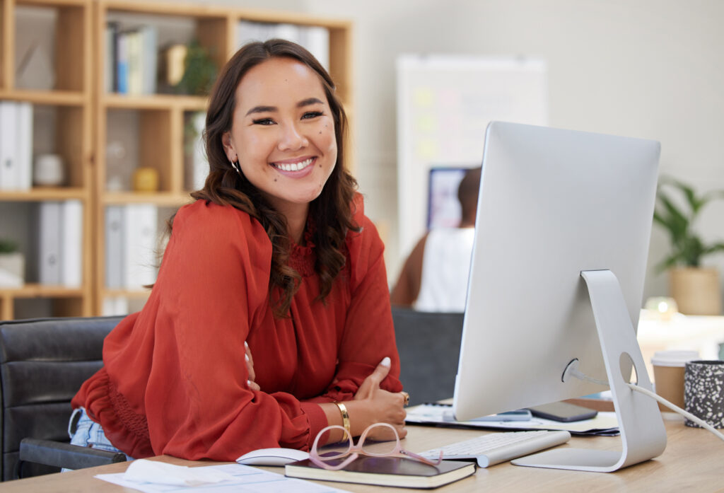 Asian Business Woman, Working On Computer At Desk In Office Or C