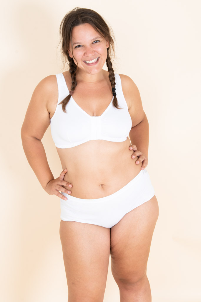 Plus Size Girl In Lingerie With Two Braids Smiling And Showing O